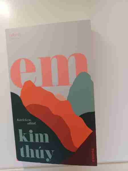 Em